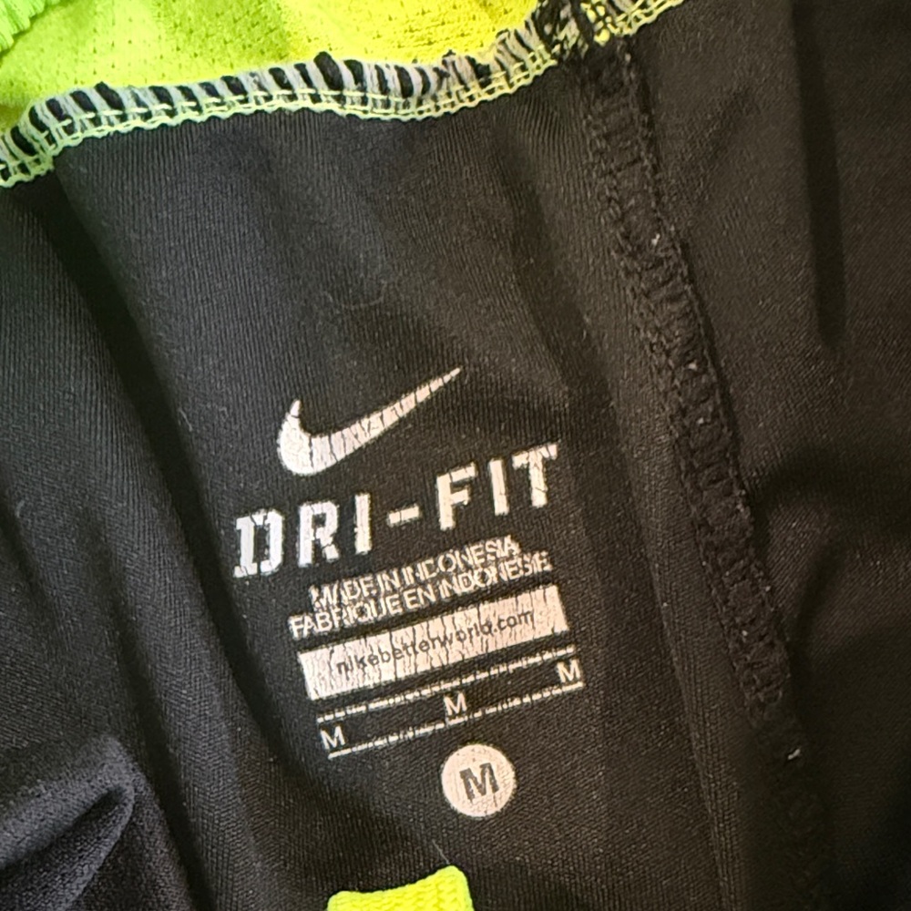 Nike Black Shorts with Neon Yellow Accents - Picture 2 of 3